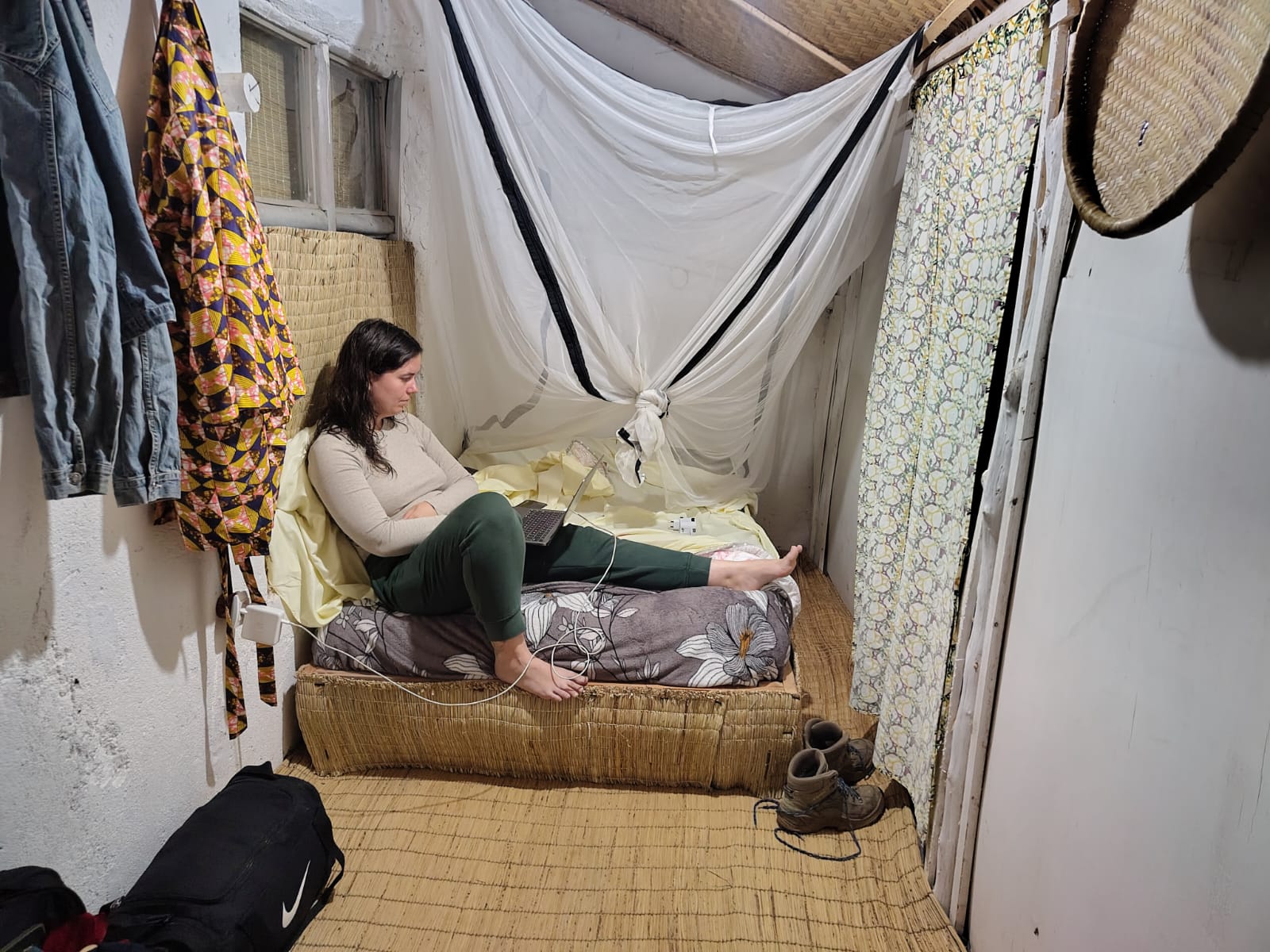 a group of clients and rwandan guide hiking